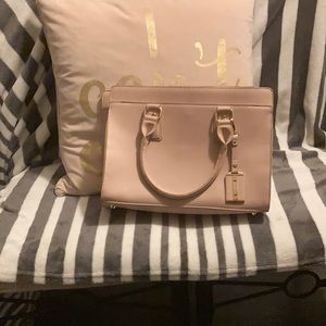 Miztigue is the name of the blush pink bag…